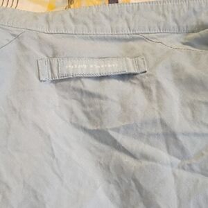 Light Blue Shirt with Subtle Logo